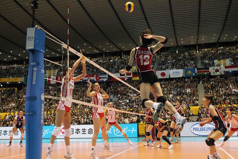 Saori Kimura of Japan attacks the Polish block